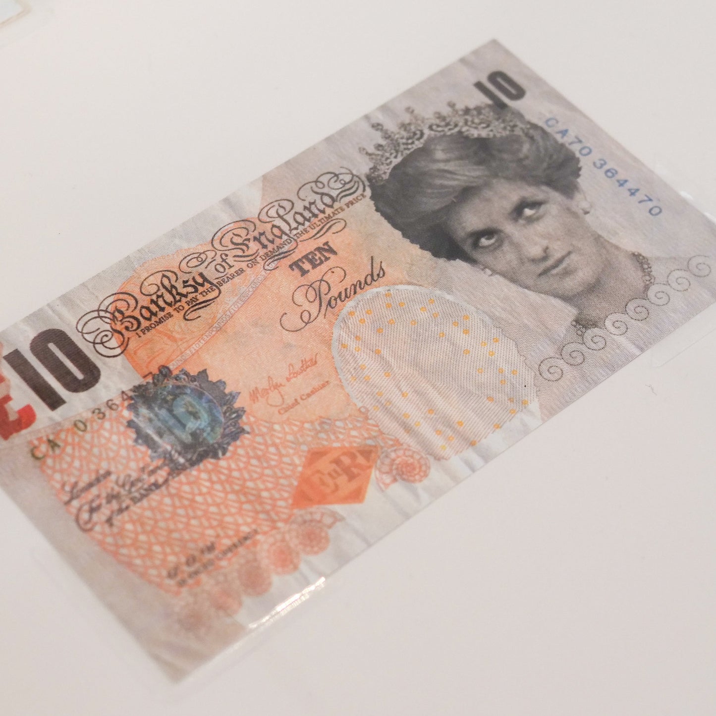 BANKSY - DI-FACED TENNER
