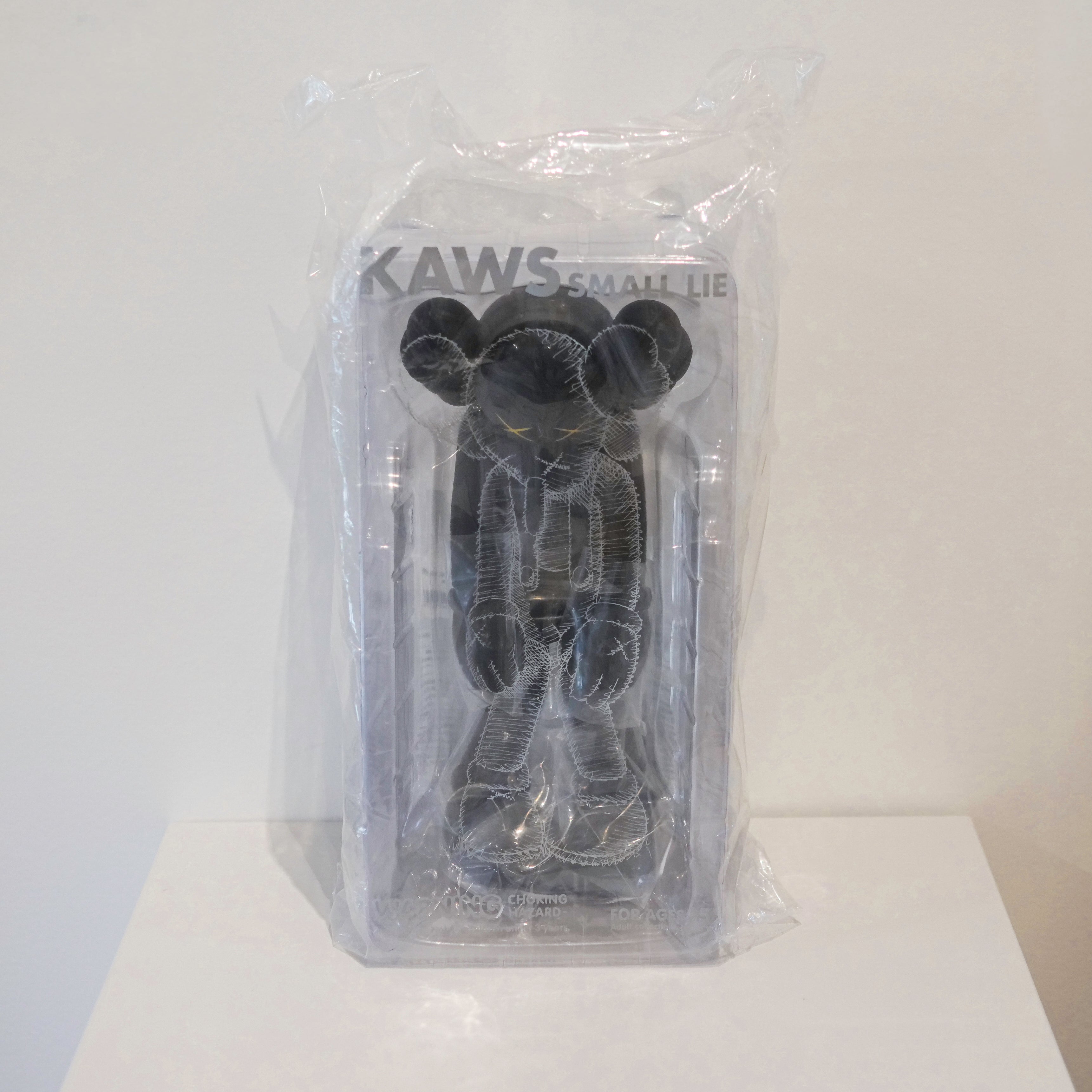 KAWS - SMALL LIE (BLACK) – The Arts Hole